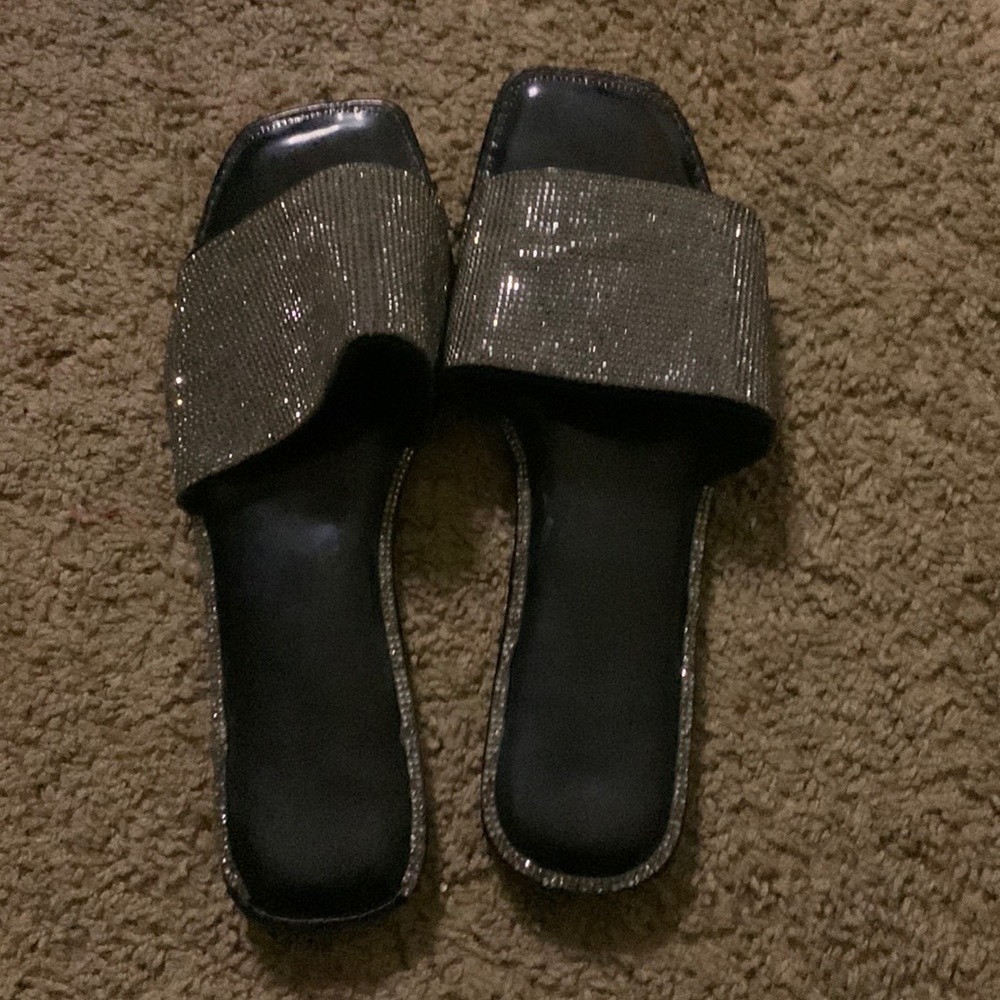 Black slides, from a shop in Florida, cleaning my closet out